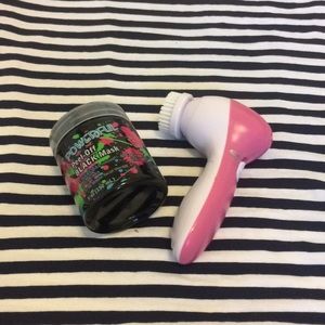 Peel off charcoal facemask. And a face brush.